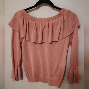 Knit pink sweater with frilled